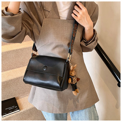 Versatile Small Square Bag With A Wide Shoulder Strap For Crossbody Wear